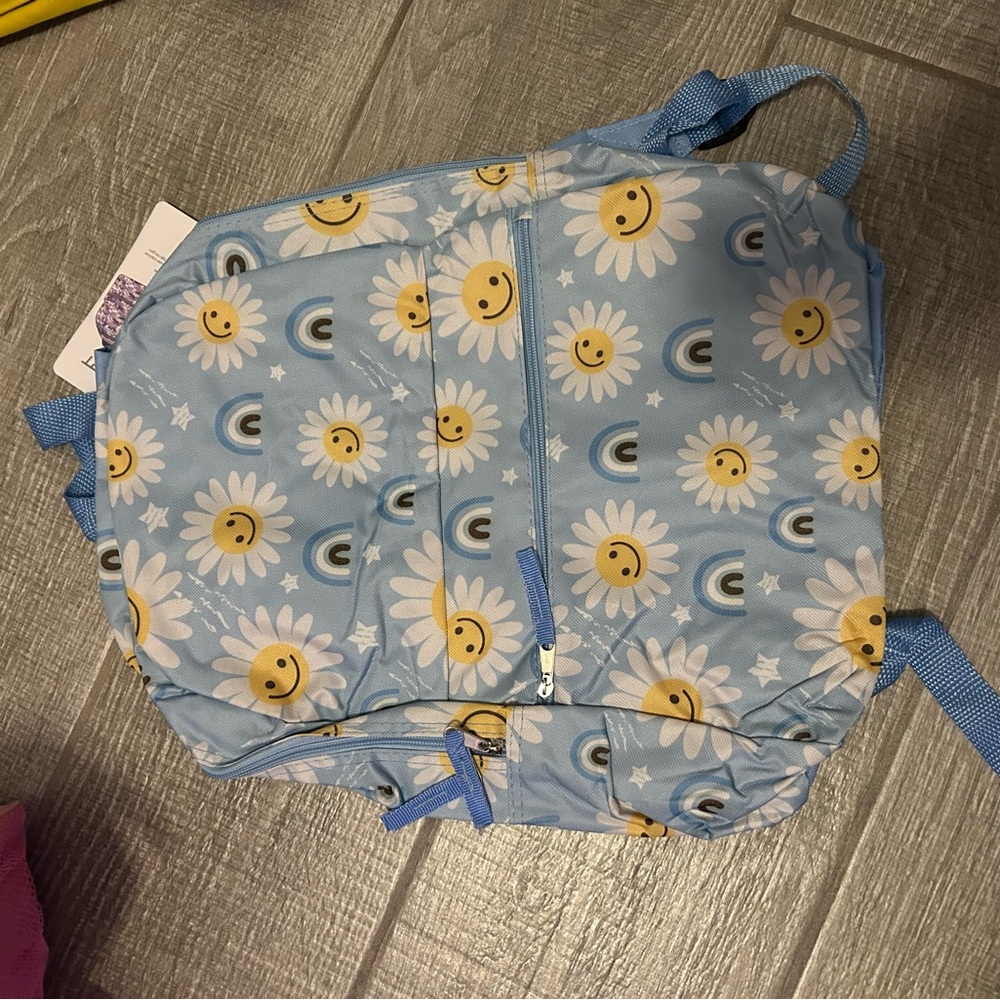 Blue Backpack with Smiley Daisy Print